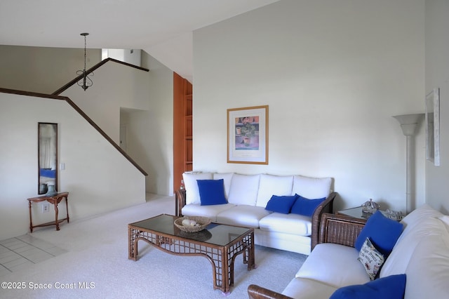 living room with carpet and lofted ceiling