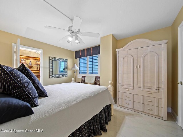 bedroom featuring ceiling fan