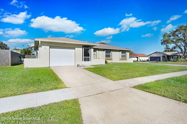 ranch-style house with a front yard and a garage