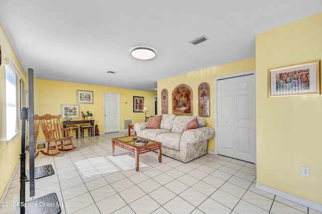 living room featuring light tile patterned floors