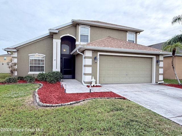 front of property featuring a front lawn