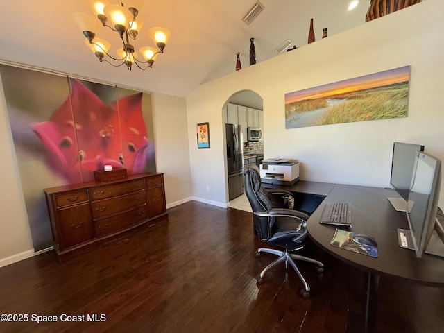 office featuring arched walkways, a chandelier, wood finished floors, visible vents, and baseboards