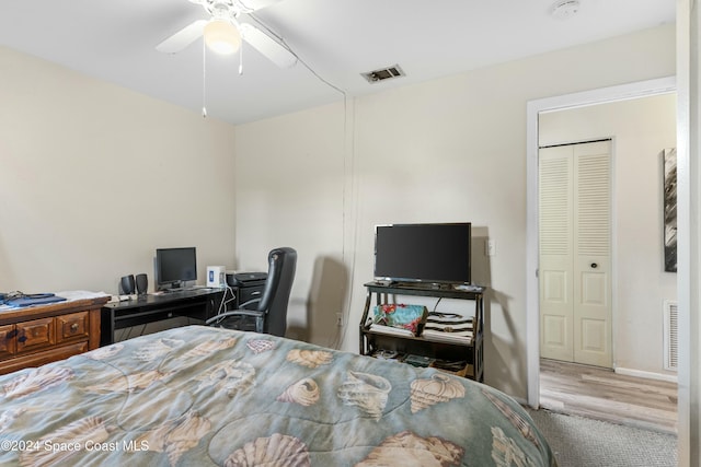 bedroom with carpet, a closet, and ceiling fan