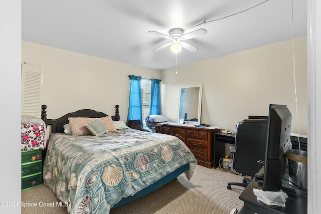 bedroom featuring ceiling fan and carpet floors