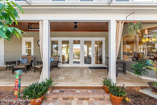 doorway to property with a patio area and french doors