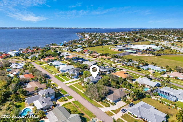 bird's eye view with a water view