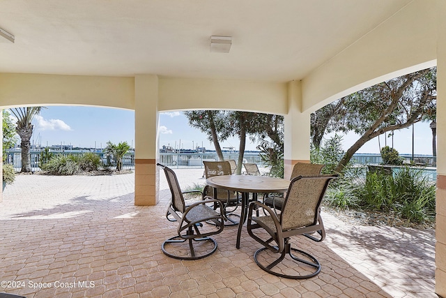 view of patio / terrace featuring a water view