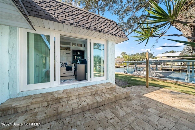 view of patio / terrace featuring a water view