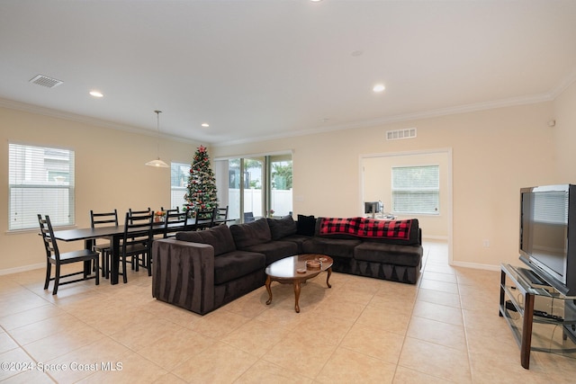 tiled living room featuring crown molding