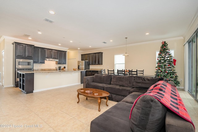 tiled living room featuring crown molding