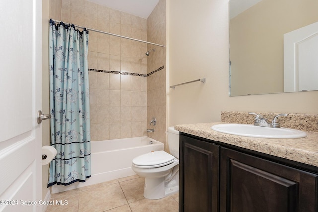 full bathroom with vanity, tile patterned flooring, shower / bathtub combination with curtain, and toilet