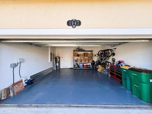 garage featuring electric water heater