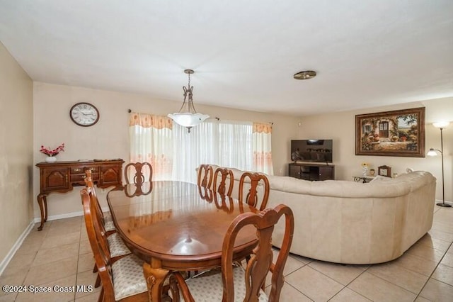 dining space with light tile patterned floors