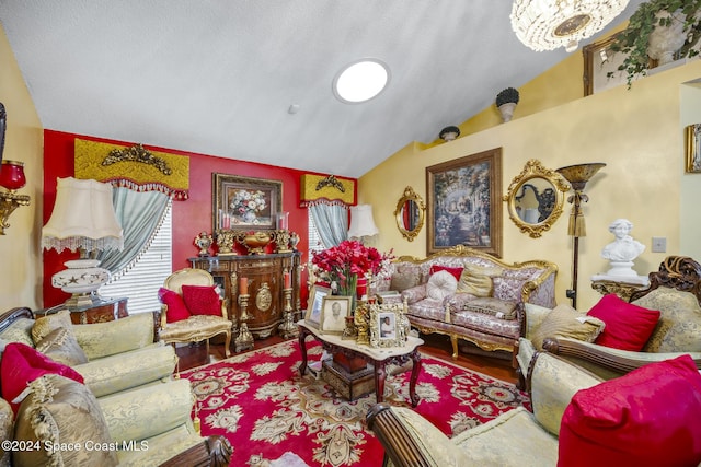 living room featuring a notable chandelier, wood-type flooring, and lofted ceiling