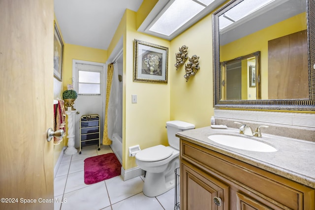 full bathroom featuring tile patterned floors, vanity, toilet, and shower / tub combo