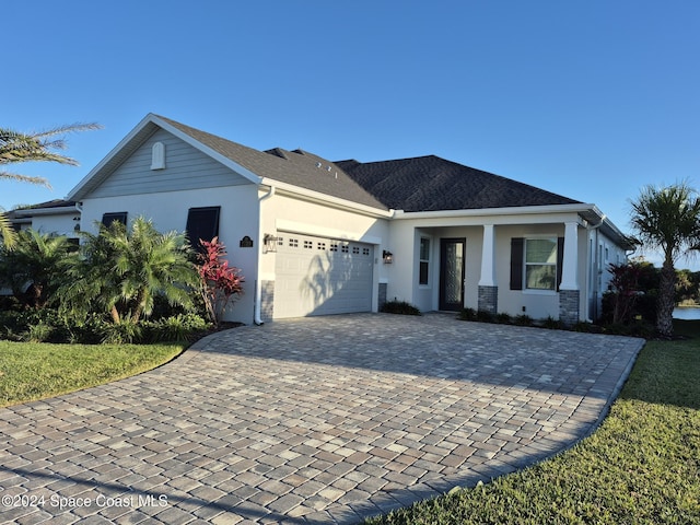 view of front of property featuring a garage