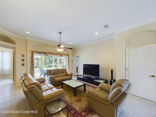 living room with ceiling fan, light tile patterned floors, and ornamental molding