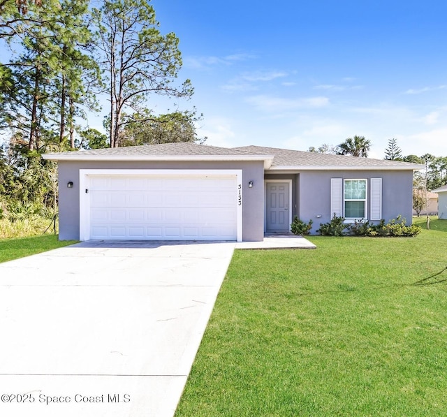 ranch-style house featuring a garage and a front yard