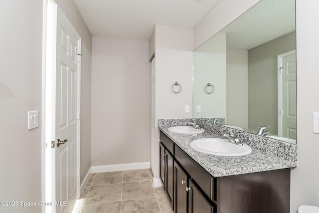 bathroom featuring vanity and tile patterned floors