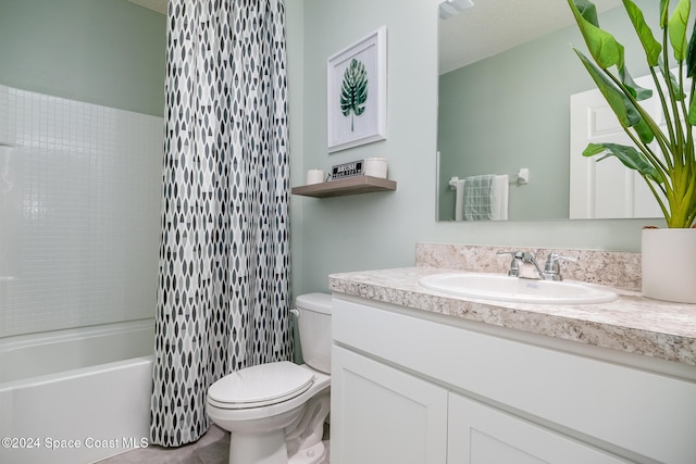 full bathroom featuring toilet, shower / tub combo with curtain, and vanity