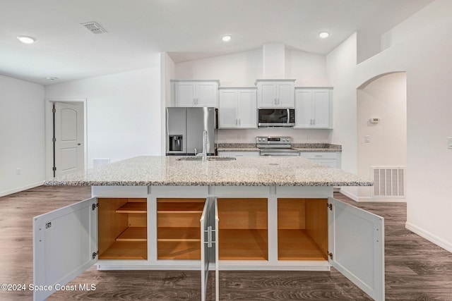 kitchen with appliances with stainless steel finishes, white cabinetry, and a kitchen island with sink