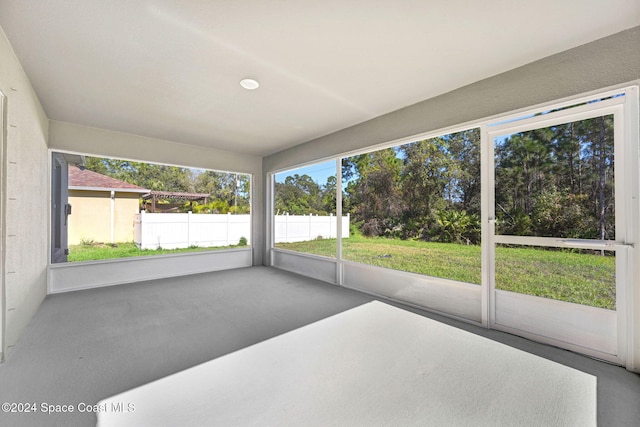 unfurnished sunroom with a healthy amount of sunlight