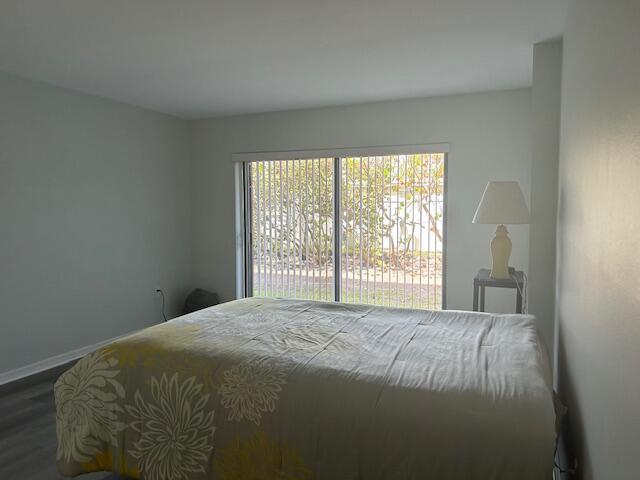 bedroom featuring wood-type flooring