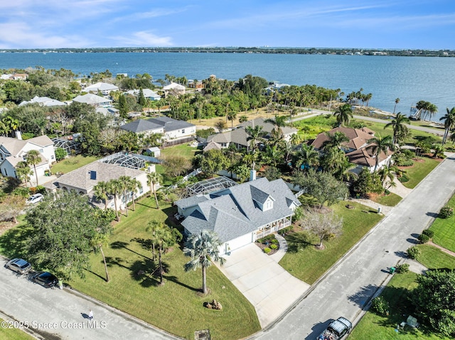 birds eye view of property featuring a water view