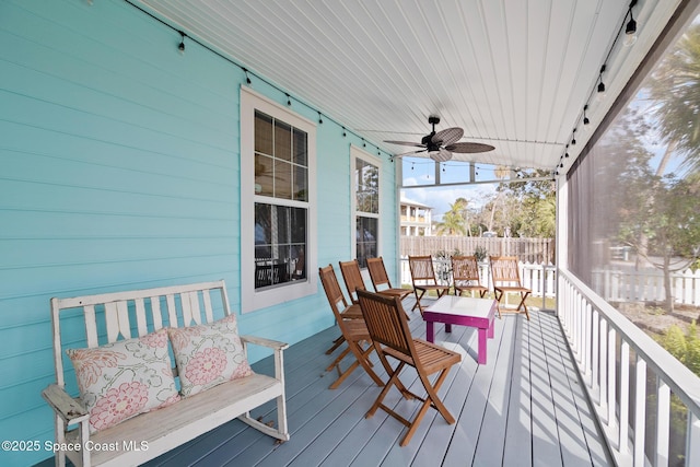 wooden terrace with ceiling fan