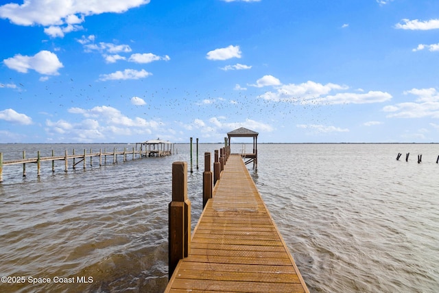 view of dock with a water view