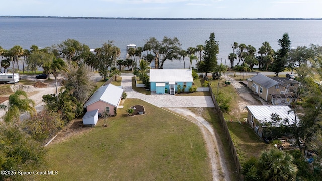 drone / aerial view with a water view