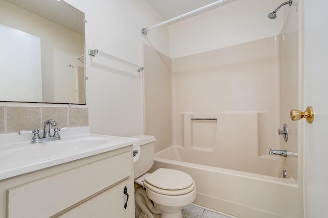 full bathroom with tasteful backsplash, tile patterned floors, vanity, bathing tub / shower combination, and toilet