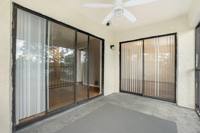 interior space featuring ceiling fan