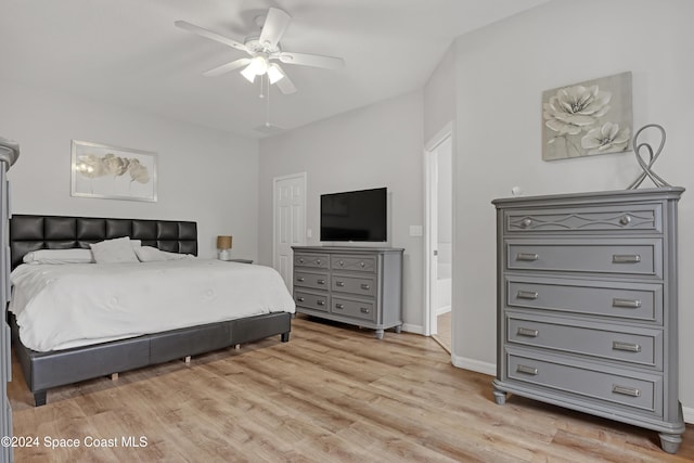 bedroom featuring ceiling fan and light hardwood / wood-style flooring