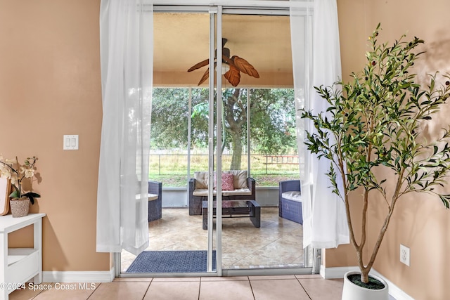 doorway featuring light tile patterned floors