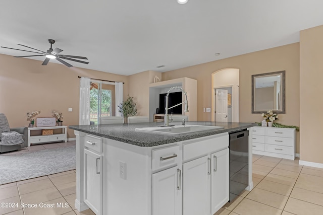 kitchen featuring dishwasher, a kitchen island with sink, white cabinets, sink, and ceiling fan