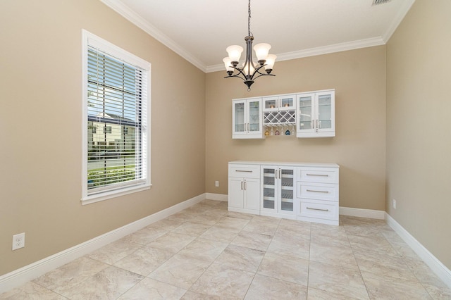 unfurnished dining area featuring an inviting chandelier and ornamental molding