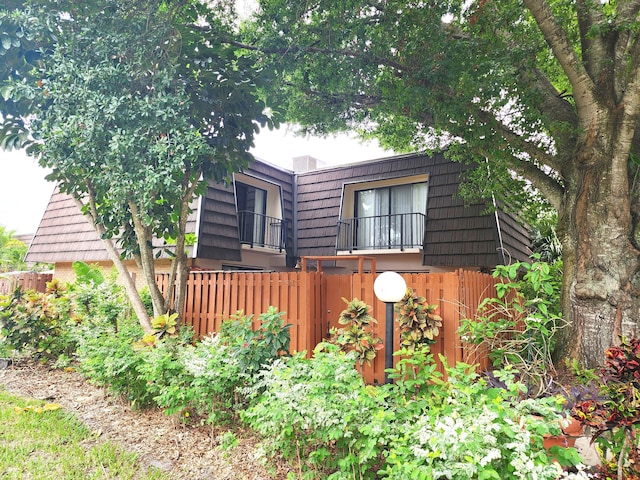 view of property exterior with a balcony