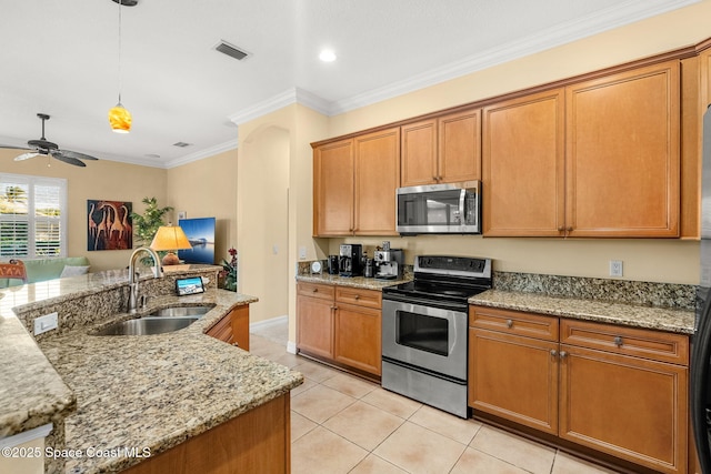 kitchen featuring ceiling fan, sink, stainless steel appliances, crown molding, and light tile patterned floors