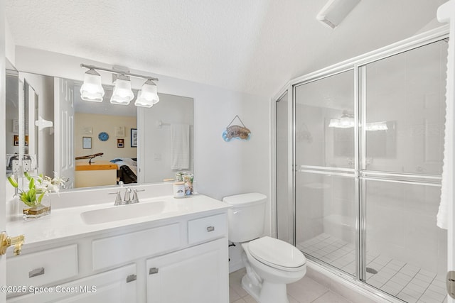 bathroom with tile patterned flooring, a textured ceiling, toilet, and a shower with door