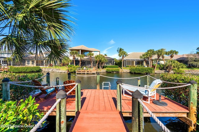 dock area featuring a water view