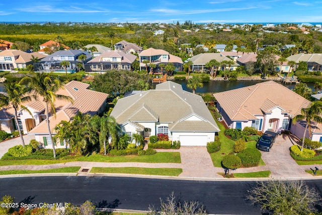 bird's eye view with a water view