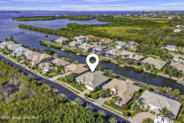 aerial view featuring a water view