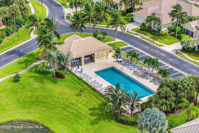 view of swimming pool with a patio