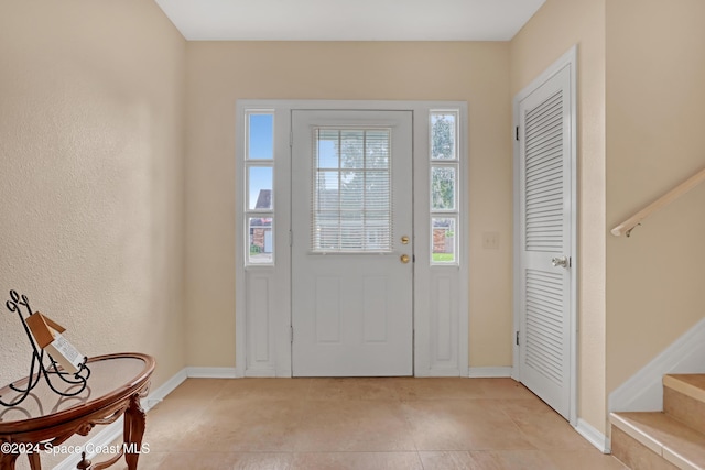 view of tiled foyer entrance