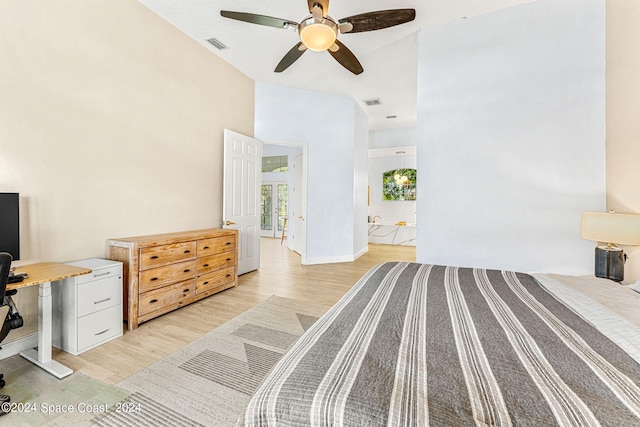 bedroom with ceiling fan and light hardwood / wood-style flooring