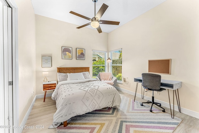 bedroom featuring ceiling fan and light hardwood / wood-style floors