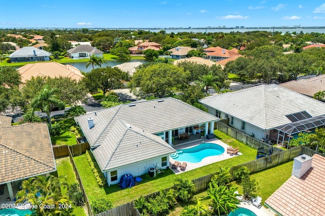 drone / aerial view with a water view