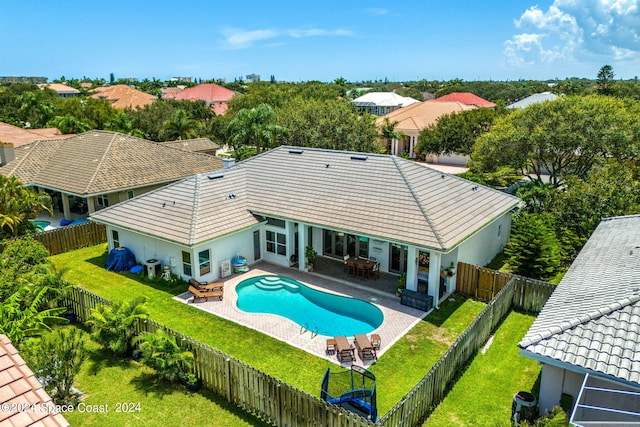 view of swimming pool featuring a patio area