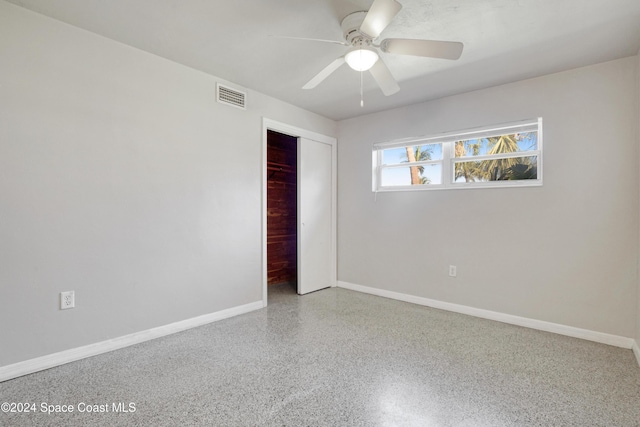 empty room with ceiling fan